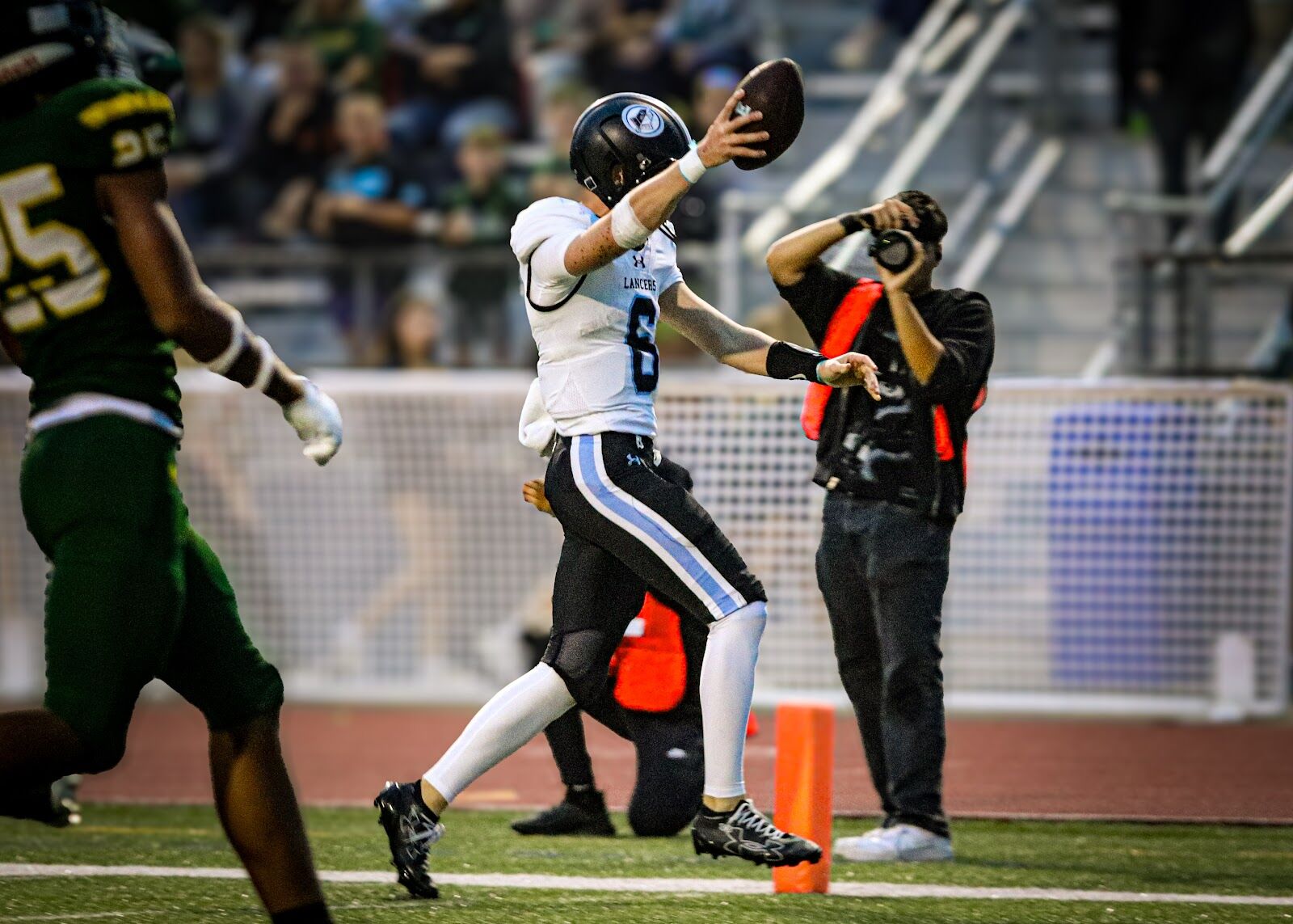 SME @ SM South — Lancers quarterback signals a touchdown