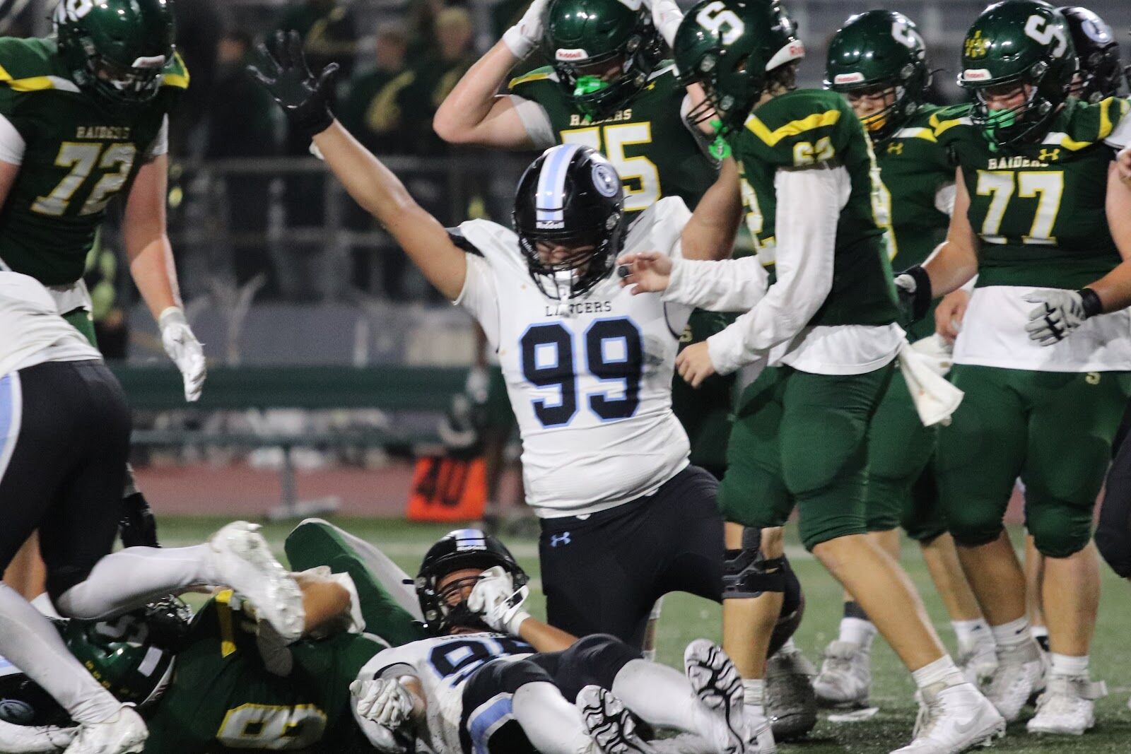SME @ SM South — #99 celebrates with teammates