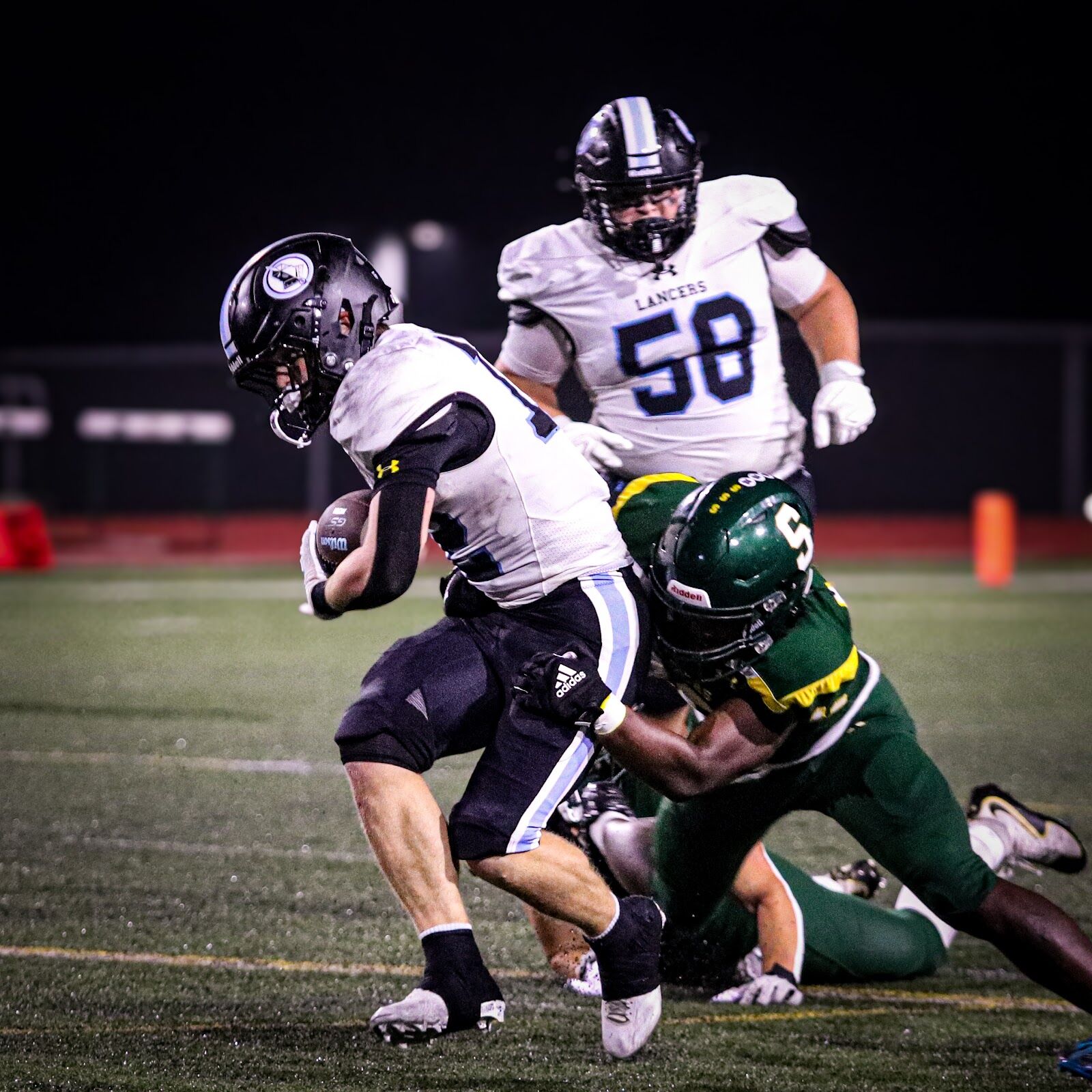 SME @ SM South — #58 leads the way for a ball carrier