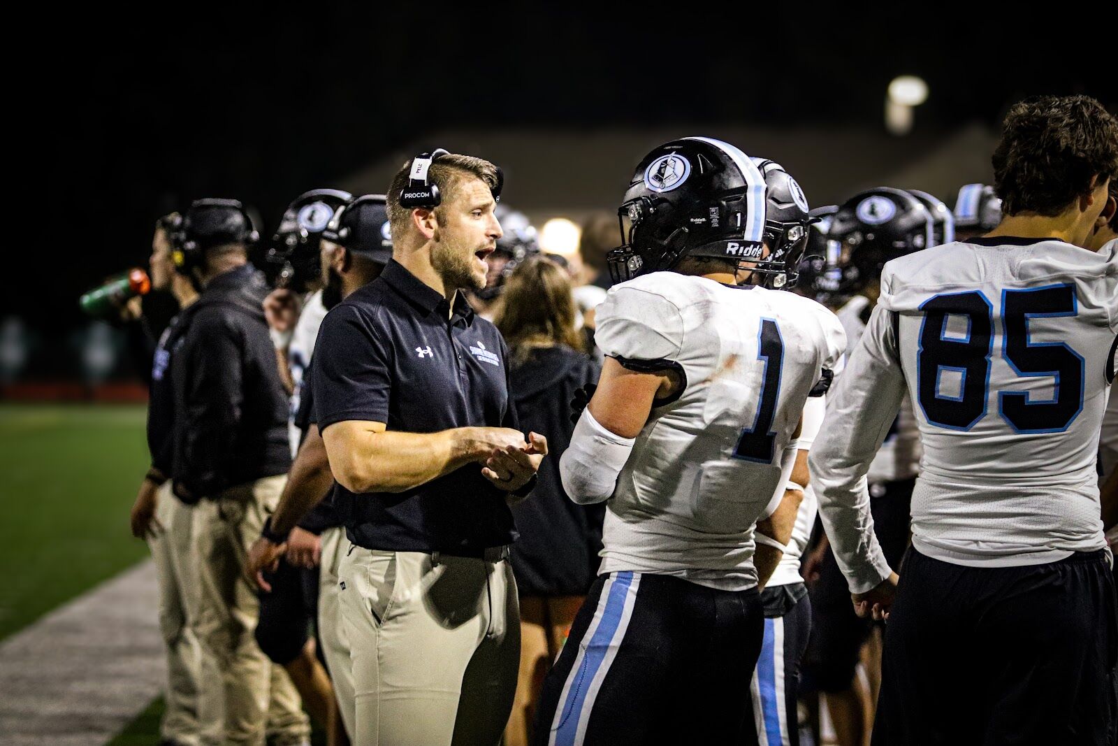 SME @ SM South — Coach talks with players on the sideline