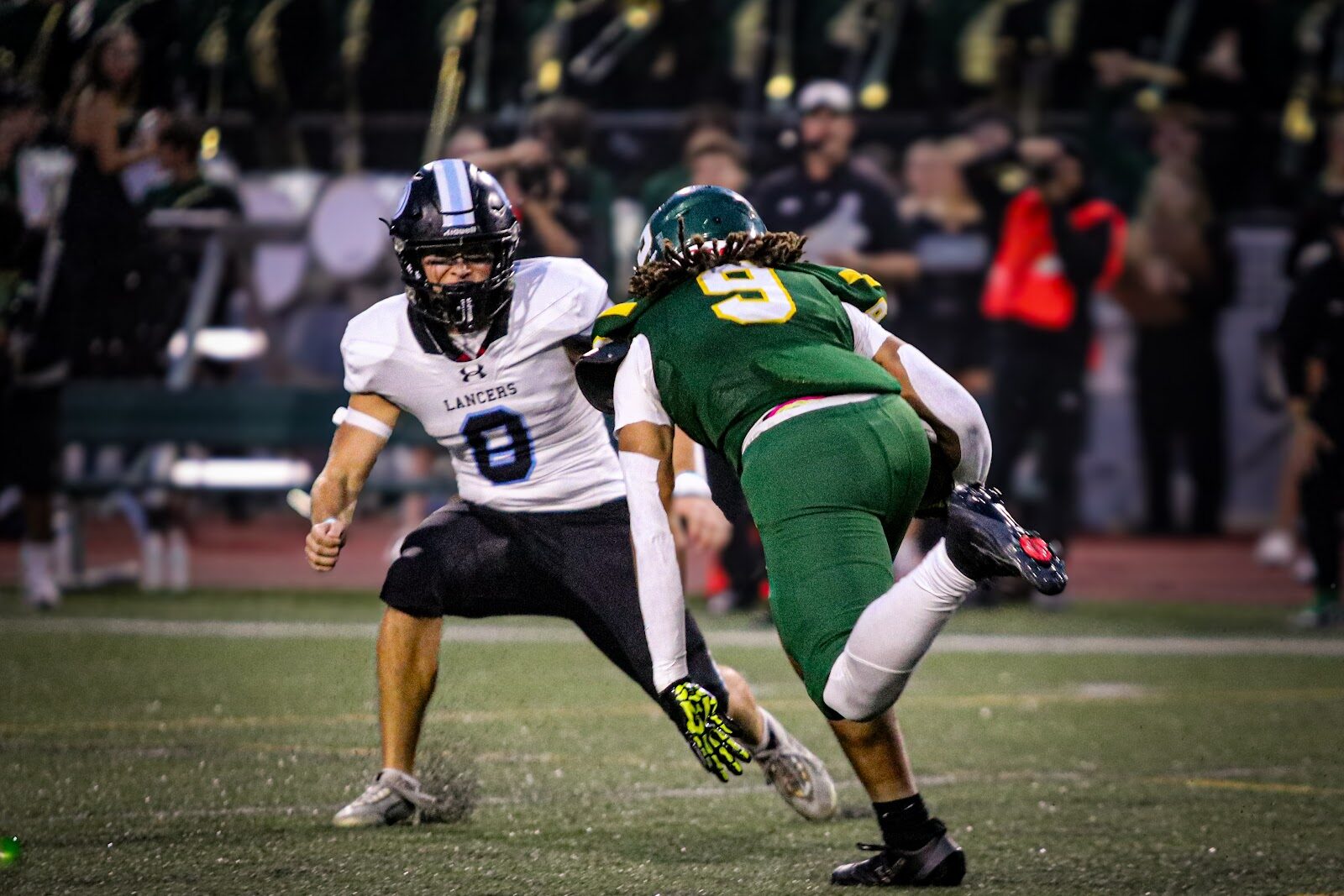 SME @ SM South — #0 squares up against a South defender